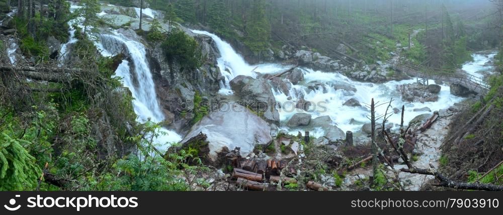 Waterfall in the Great Cold Valley (Velka Studena dolina) summer cloudy view. High Tatras, Slovakia.