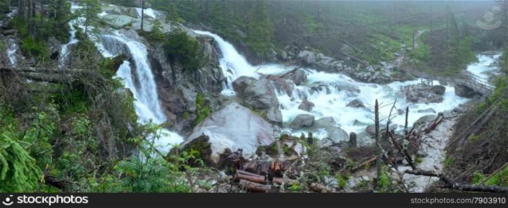 Waterfall in the Great Cold Valley (Velka Studena dolina) summer cloudy view. High Tatras, Slovakia.