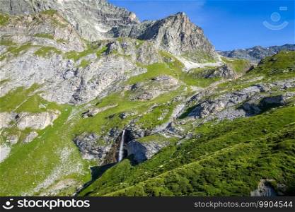 Waterfall in Vanoise national Park alpine valley, Savoie, French alps. Waterfall in Vanoise national Park valley, French alps