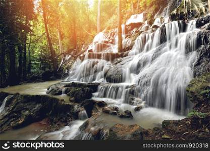 Waterfall landscape forest mountain and bamboo tree wild tropical waterfall thailand jungle river stream on the rock
