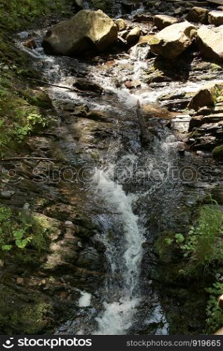 waterfall. mountain waterfall in park