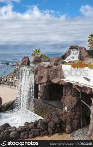 waterfall next to the sea in the Canary Islands, Tenerife