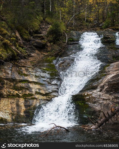 Waterfall on river Shinok in Altai territory, Siberia, Russia