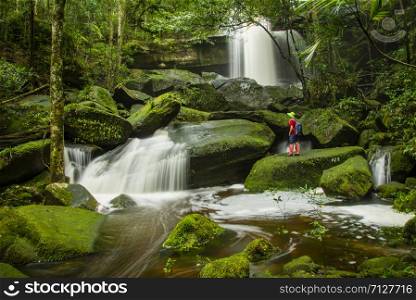 Waterfall thailand landscape beautiful rainforest at Phu Kradueng National Park in Thailand with tree green moss on the rock in the river stream mountain asia jungle with hiking