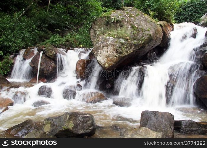 Waterfall with big rocks in Sri Lanka