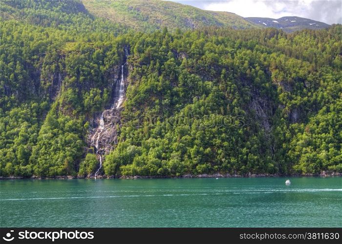 waterfalls northern Norwegian fjords.