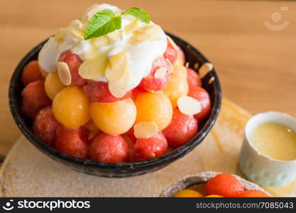 Watermelon and Melon bingsu on a wood tray, Korean ice dessert