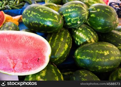 Watermelons on a market. Heap of watermelons.