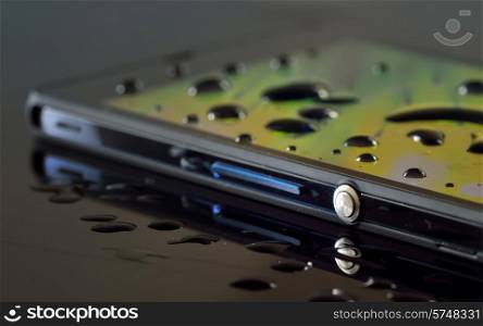 waterproof smartphone with drops and reflexion