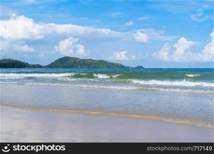 Wave at Phuket beach, Andaman Sea at noon in Thailand. Nature sky background.