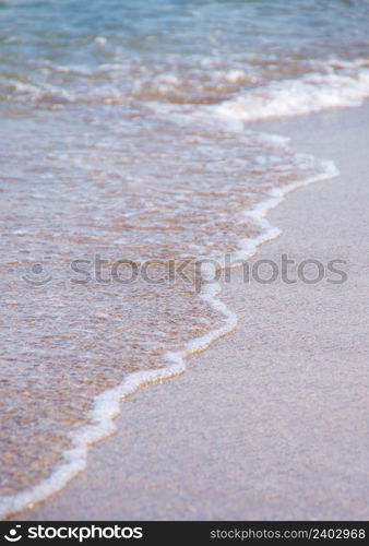 Wave of the sea on the beach