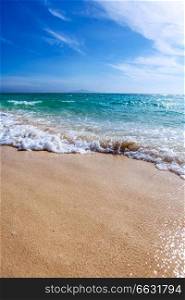 Wave of the sea on the sandy tropical beach. Wave of sea on sandy beach