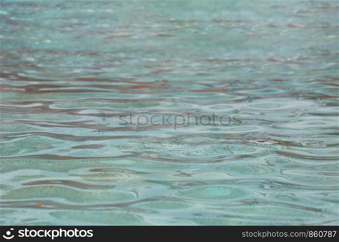 Wave of water in the pool for design in your work water concept.