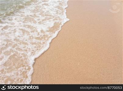 wave on the sandy beach