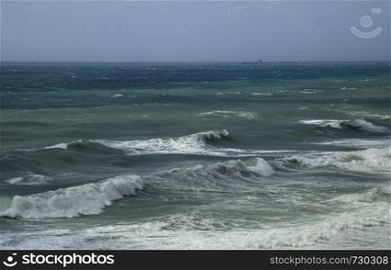 Wave on the sea surface. Seascape in stormy day.