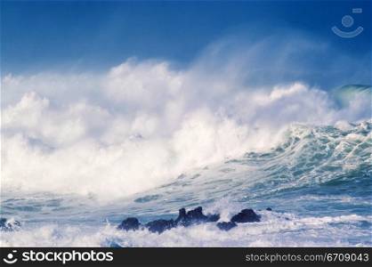 Waves breaking in the sea