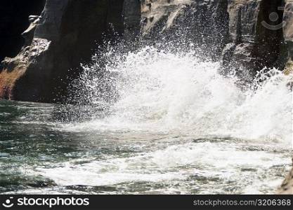 Waves crashing against a rock formation, La Jolla Reefs, San Diego, California, USA