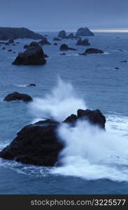 Waves Crashing on Rocks