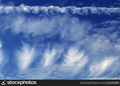 Waves Of Thin Clouds In A Blue Sky
