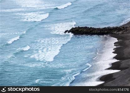 waves on pebble beach in Lima Peru