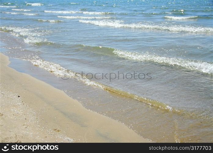 Waves on sandy beach