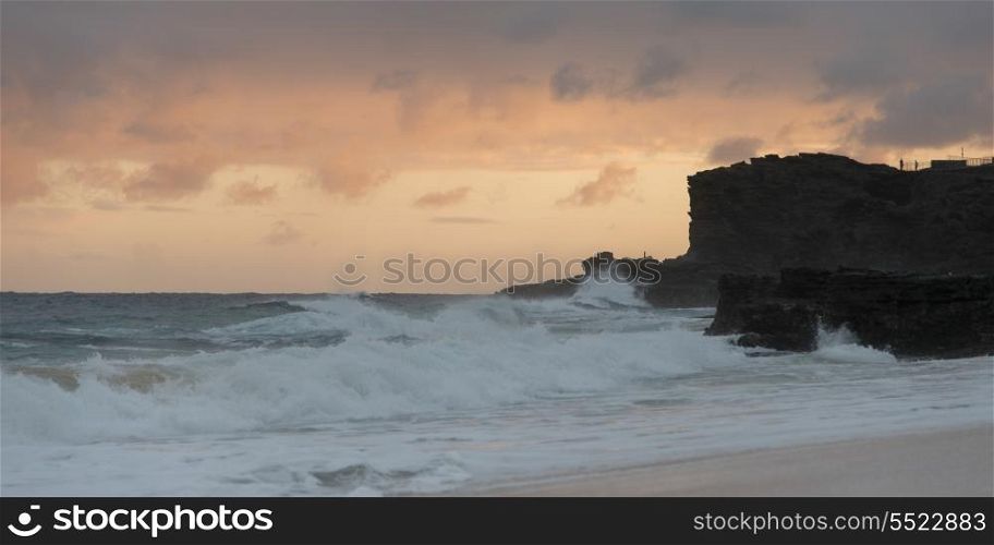 Waves on the beach at sunset, Sandy Beach, Hawaii Kai, Honolulu, Oahu, Hawaii, USA