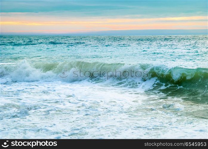 Waves on the sea. Sea landscape with big waves and sunset