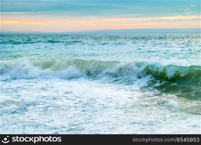 Waves on the sea. Sea landscape with big waves and sunset