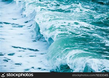 waves on the surface of the blue sea