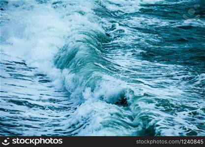 waves on the surface of the blue sea