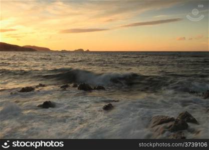 Waves wash over rocks, Ile Rousse