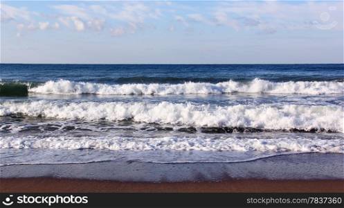 Waves wash over sand on Black Sea beach
