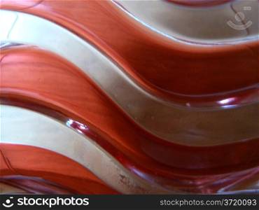 Wavey red. Waves red pattern in glass as a background