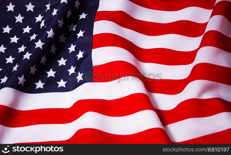 Waving American flag. Beautifully waving star and striped American flag