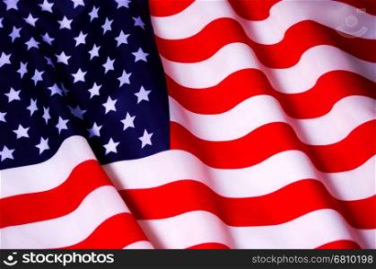 Waving American flag. Beautifully waving star and striped American flag