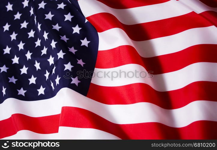 Waving American flag. Beautifully waving star and striped American flag