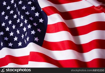 Waving American flag. Beautifully waving star and striped American flag