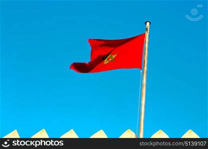 waving flag in the blue sky tunisia colour and wave battlements