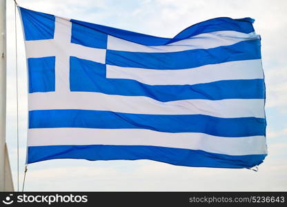 waving greece flag in the blue sky and flagpole