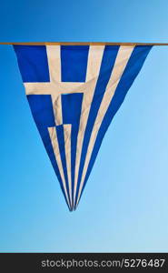 waving greece flag in the blue sky and flagpole