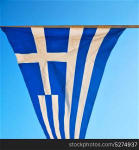 waving greece flan in the blue sky and flagpole