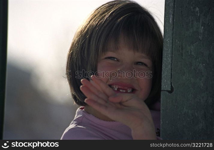 Waving Young Girl