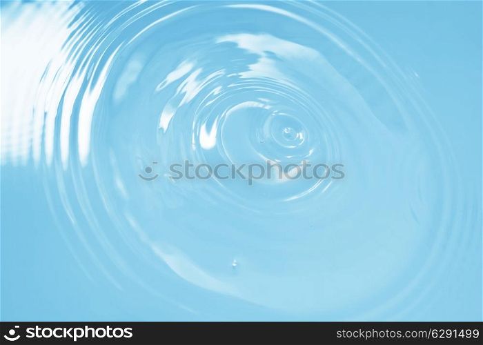 Wavy beautiful blue water surface close up