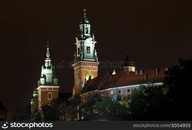 Wawel Castle at night in Krakow , Poland.