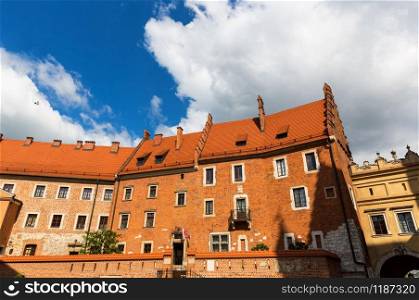 Wawel castle building in sunny day, Krakow, Poland. European town with ancient architecture, famous place for travel and tourism