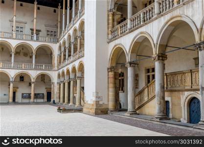 Wawel Castle is located on a hill at an altitude of 228 meters o. Krakow, Poland - August 13, 2017: courtyard of the royal castle of Wawel in Krakow