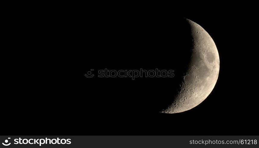 Waxing crescent moon seen with telescope. Waxing crescent moon seen with an astronomical telescope - 4K format (taken with my own telescope, no NASA images used)