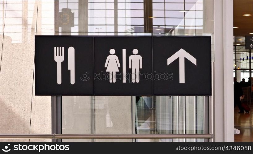 Way-finding signage in airport terminal.