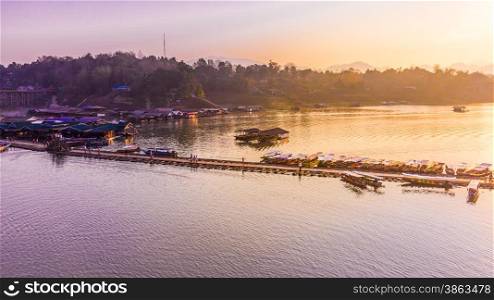 Way of life at wooden bridge and raft in the morning, at Samprasob river,Kanchanaburi Thailand