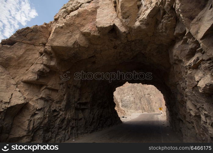 way through the cave in the mountain. The Andes, the Atacama, Peru